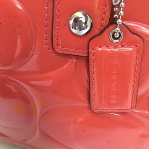 Nice Coach patent leather purse.  Orange.